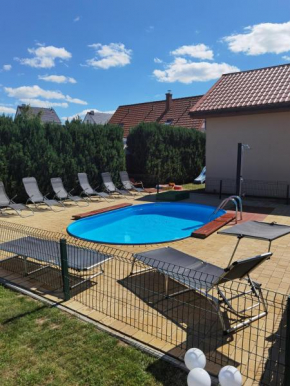 Ferienhäuser mit Pool, Rewal